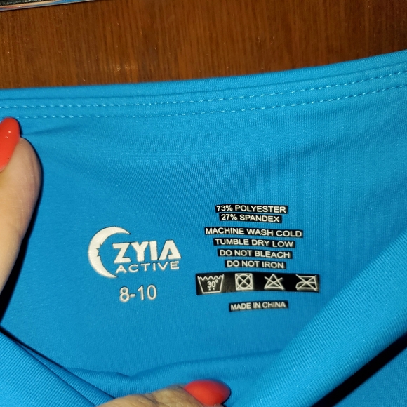 ZYIA Active Turquoise Pocket Crop Leggings Sz 8-10 - Picture 2 of 3